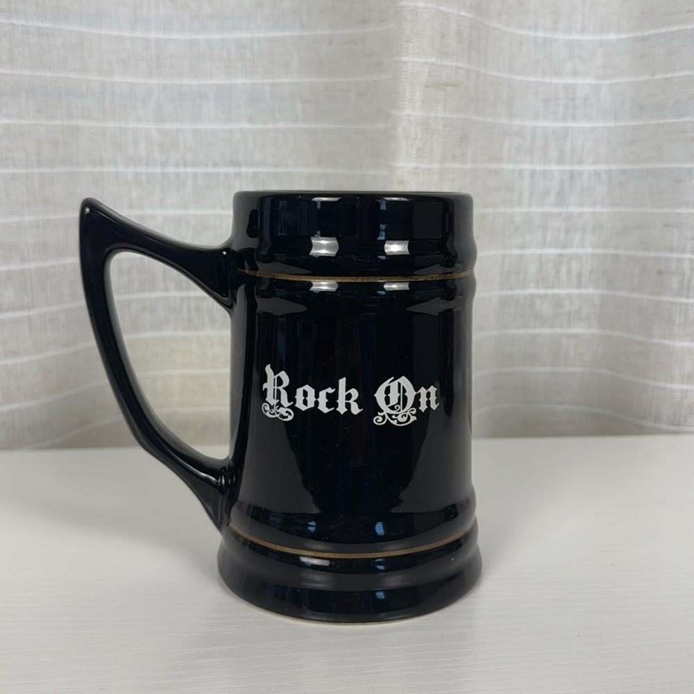 Black Ceramic Coffee Stein with Glossy Finish and Textured Design